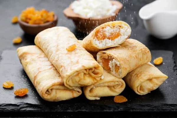 Z czym naleśniki na słodko? Odkryj pyszne dodatki i przepisy